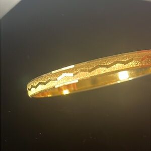 Signed Vintage 1980s Monet Textured Gold Tone Etched Zig Zag Bangle Bracelet
